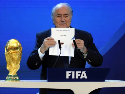 FILE - FIFA President Joseph S. Blatter announces that Qatar will be hosting the 2022 Soccer World Cup, on Thursday, Dec. 2, 2010, during the FIFA 2018 and 2022 World Cup Bid Announcement in Zurich, Switzerland. Former FIFA president Sepp Blatter said on Tuesday, Nov. 8, 2022, that picking Qatar to host the World Cup was a mistake 12 years ago(AP Photo/Keystone/Walter Bieri, File)