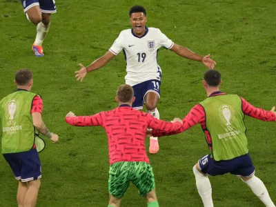 England's Ollie Watkins celebrates after scoring his side's second goal during a semifinal match between the Netherlands and England at the Euro 2024 soccer tournament in Dortmund, Germany, Wednesday, July 10, 2024. (AP Photo/Andreea Alexandru)