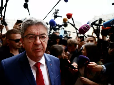 Jean-Luc Melenchon, leader of French far-left opposition party La France Insoumise (France Unbowed - LFI), talks to journalists in front of the National Assembly in Paris after the second round of the early French parliamentary elections, France, July 9, 2024. REUTERS/Yara Nardi