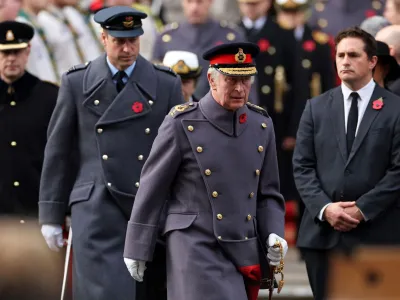 Britain's Prince William, Prince of Wales and Britain's King Charles arrive to attend the Remembrance Sunday ceremony at the Cenotaph on Whitehall in central London, Britain November 13, 2022. Isabel Infantes/Pool via REUTERS