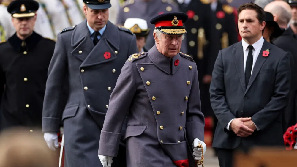 Britain's Prince William, Prince of Wales and Britain's King Charles arrive to attend the Remembrance Sunday ceremony at the Cenotaph on Whitehall in central London, Britain November 13, 2022. Isabel Infantes/Pool via REUTERS