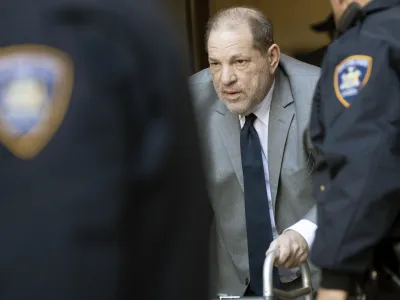 ﻿Harvey Weinstein, center, is escorted by court officers as he leaves court for the day during jury selection in his trial on rape and sexual assault charges, Wednesday, Jan. 15, 2020, in New York. Jury selection continues Thursday. (AP Photo/Mary Altaffer)