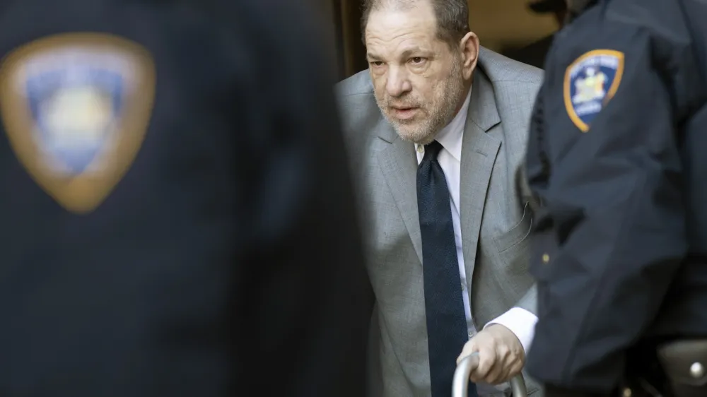 ﻿Harvey Weinstein, center, is escorted by court officers as he leaves court for the day during jury selection in his trial on rape and sexual assault charges, Wednesday, Jan. 15, 2020, in New York. Jury selection continues Thursday. (AP Photo/Mary Altaffer)