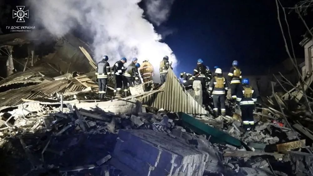 Rescuers work at the site of a maternity ward of a hospital destroyed by a Russian missile attack, as their attack on Ukraine continues, in Vilniansk, Zaporizhzhia region, Ukraine November 23, 2022 in this still image from video. State Emergency Service of Ukraine/Handout via REUTERS  ATTENTION EDITORS - THIS IMAGE HAS BEEN SUPPLIED BY A THIRD PARTY. MANDATORY CREDIT.