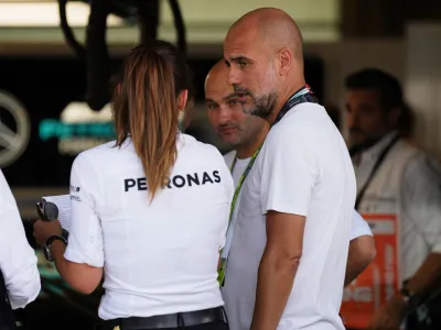 Formula One F1 - Abu Dhabi Grand Prix - Yas Marina Circuit, Abu Dhabi, United Arab Emirates - November 20, 2022 Manchester City manager Pep Guardiola is pictured at the Mercedes garage ahead the race REUTERS/Aleksandra Szmigiel