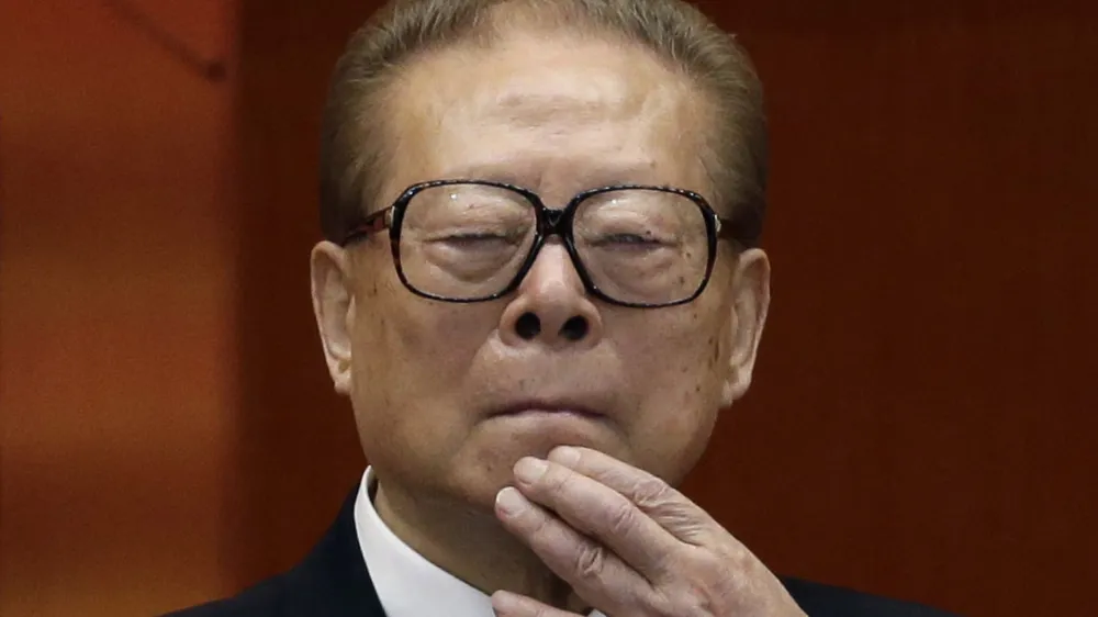 FILE - Former Chinese President Jiang Zemin watches the proceedings at the opening session of the 18th Communist Party Congress held at the Great Hall of the People in Beijing, Nov. 8, 2012. Jiang has died Wednesday, Nov. 30, 2022, at age 96. (AP Photo/Ng Han Guan, File)