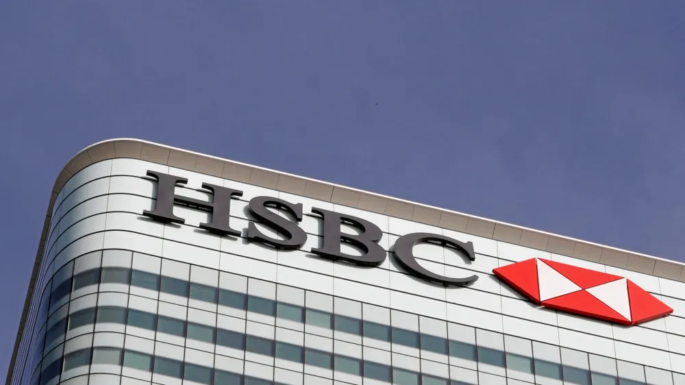 FILE PHOTO: The HSBC bank logo is seen in the Canary Wharf financial district in London, Britain, March 3, 2016. REUTERS/Reinhard Krause/File Photo