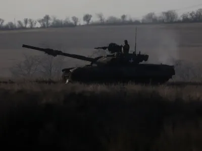 A tank containing members of the 68th Independent Jager Brigade of the Ukrainian Army prepare to fire on a Russian military target on the frontline in the Southern Donbas region in Ukraine, November 29, 2022. REUTERS/Leah Millis