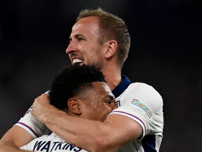 10 July 2024, North Rhine-Westphalia, Dortmund: England's Ollie Watkins (below) and England's Harry Kane celebrate after the win of the UEFA Euro 2024 Semi-final soccer match between Netherlands and England at BVB Stadion Dortmund. Photo: Bernd Thissen/dpa