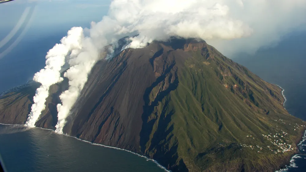 Photo released Thursday March 1, 2007 by the Italian Civil Protection of an aerial view of the Stromboli island volcano during eruptive activity in southern Italy, Tuesday, Feb. 27, 2007. Lava continued to pour down Stromboli's slopes and into the Mediterranean near Sicily as experts continued to monitor eruption activity on one of Europe's most active volcanoes. (AP Photo/Protezione Civile Italiana, HO)