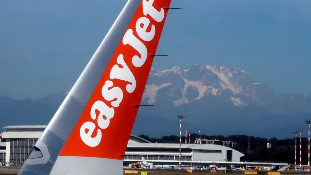 FILE PHOTO: An EasyJet Airbus A320 aircraft is seen at Malpensa Airport near Milan, Italy, October 3, 2018.  REUTERS/Stefano Rellandini/File Photo