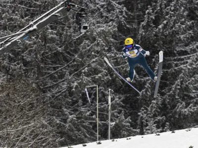 Japan's Sara Takanashi jumps from the Hochfirstschanze during the 1st round of large hill mixed at the Nordic skiing/ski jumping World Cup, in Titisee-Neustadt, Germany, Saturday Dec. 10, 2022. (Philipp von Ditfurth/dpa via AP)