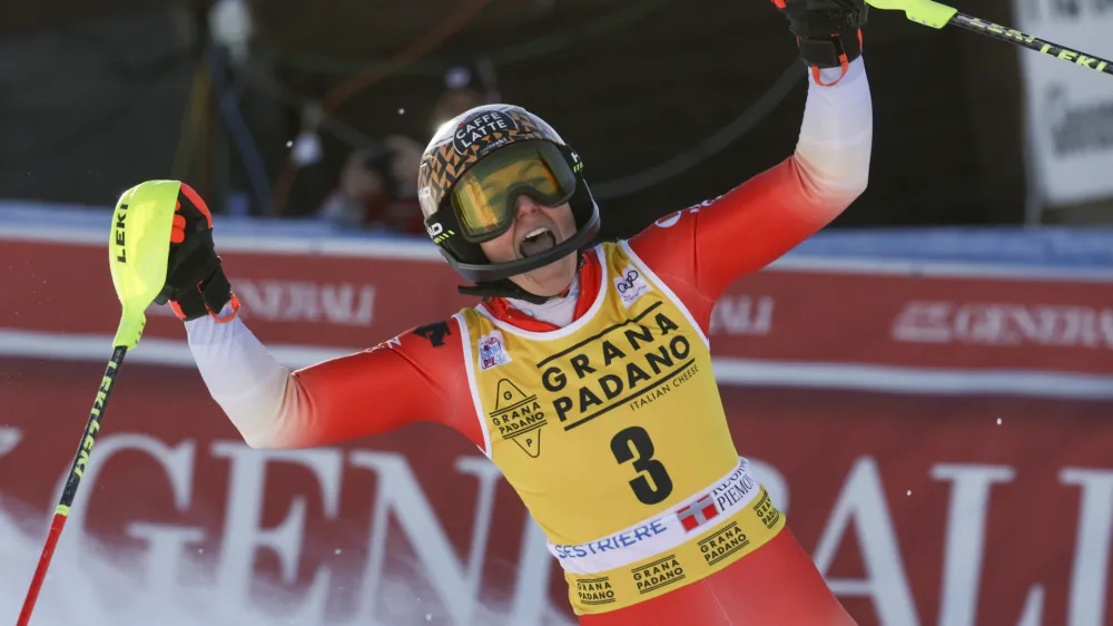 Switzerland's Wendy Holdener celebrates at the finish area of an alpine ski, women's World Cup slalom, in Sestriere, Italy, Sunday, Dec.11, 2022. (AP Photo/Alessandro Trovati)