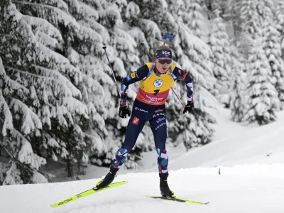 Johannes Thingnes Boe of Norway competes during the men's 12.5km pursuit race at the Biathlon World Cup in Hochfilzen, Austria, Sunday, Dec. 11, 2022. (AP Photo/Andreas Schaad)