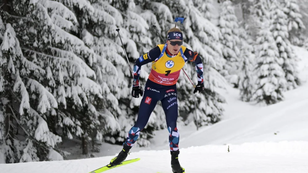 Johannes Thingnes Boe of Norway competes during the men's 12.5km pursuit race at the Biathlon World Cup in Hochfilzen, Austria, Sunday, Dec. 11, 2022. (AP Photo/Andreas Schaad)