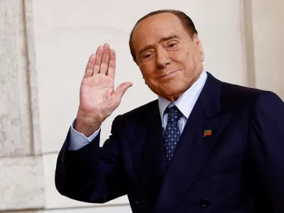 FILE PHOTO: Forza Italia leader and former Prime Minister Silvio Berlusconi arrives for a meeting with Italian President Sergio Mattarella at the Quirinale Palace in Rome, Italy October 21, 2022. REUTERS/Guglielmo Mangiapane/File Photo