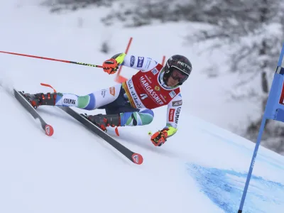 Slovenia's Zan Kranjec speeds down the course during the first run of an alpine ski, men's World Cup giant slalom, in Val D'Isere, France, Saturday, Dec.10, 2022. (AP Photo/Marco Trovati)