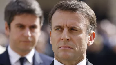 FILE - French Prime Minister Gabriel Attal, left, and French President Emmanuel Macron attend a "national tribute" ceremony to late French politician and admiral, Philippe de Gaulle, son of General de Gaulle, in Paris, Wednesday, March 20, 2024. French President Emmanual Macron refused the resignation Monday July 8, 2024 of the country's prime minister, asking him on Monday to remain temporarily as the head of the government after chaotic election results left the government in limbo. (Ludovic Marin, Pool via AP, File)