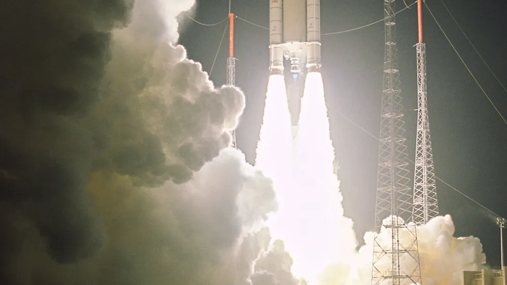 In this picture made available Sunday, March 12, 2006 by the European Space Agency (ESA), the rocket Ariane 5 ECA lifts off from the European Space Station in Kourou, French Guiana, late Saturday, March 11. A European space consortium rocket loaded with two satellites lifted off Saturday into a cloudy night sky, the first launch of the year for the Ariane-5 rocket after three delays, officials said. The Ariane-5 carried satellites for the Spanish defense ministry and for Paris-based Eutelsat Communications SA, Arianespace, the commercial arm of the 13-country European Space Agency, said in a statement. (AP Photo/ESA/HO)