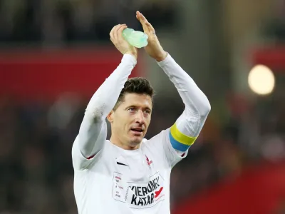 FILE PHOTO: Soccer Football - World Cup - UEFA Qualifiers - Path B Playoff Final - Poland v Sweden - Silesian Stadium, Chorzow, Poland - March 29, 2022 Poland's Robert Lewandowski celebrates after qualifying for the World Cup Qatar 2022 REUTERS/Kacper Pempel/File Photo