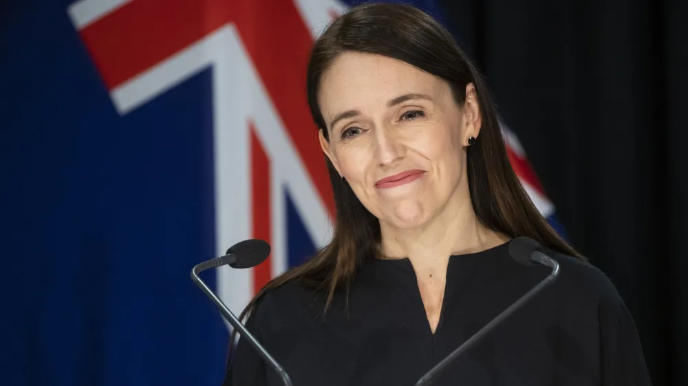 New Zealand Prime Minister Jacinda Ardern during the post-Cabinet press conference at Parliament, in Wellington, New Zealand, Monday, Sept. 12, 2022. New Zealand removed most of its remaining COVID-19 restrictions, as the government signaled a return to normalcy for the first time since the pandemic began. (Mark Mitchell/New Zealand Herald via AP)