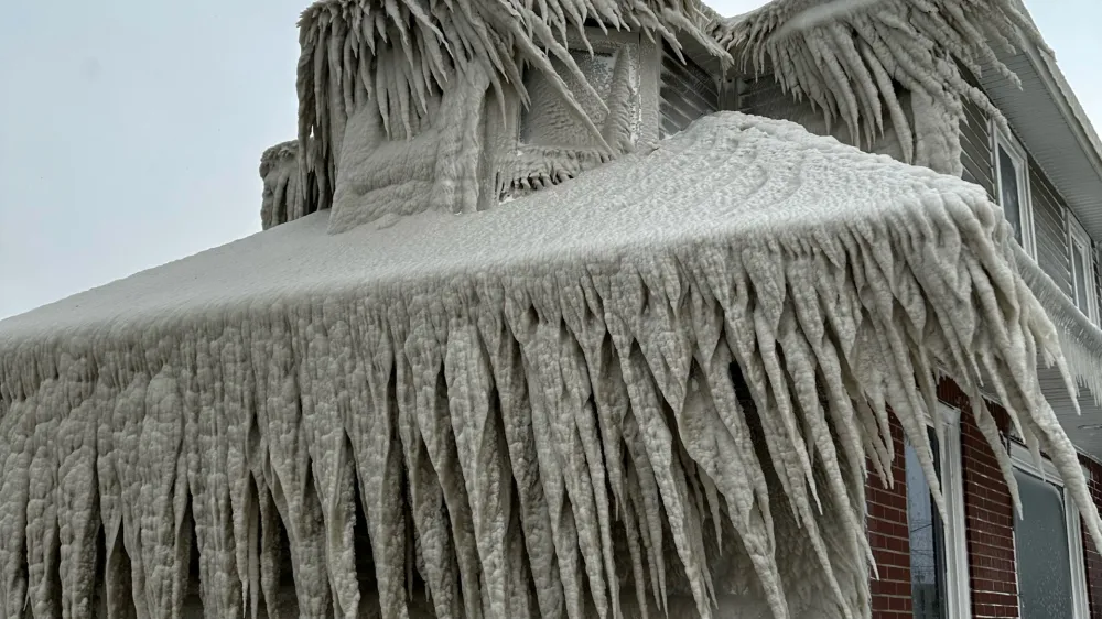 Hoak's restaurant is covered in ice from the spray of Lake Erie waves during a winter storm that hit the Buffalo region in Hamburg, New York, U.S. December 24, 2022.  Kevin Hoak/ via REUTERS THIS IMAGE HAS BEEN SUPPLIED BY A THIRD PARTY.