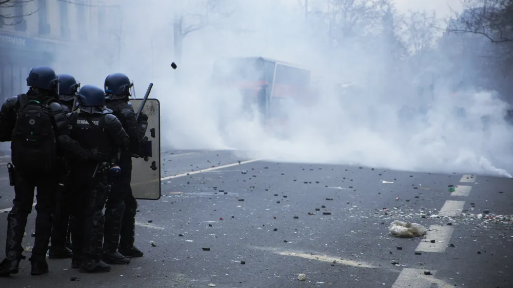 24 December 2022, France, Paris: Police use tear gas against demonstrators during clashes between them, following the death of three people when shots were fired at a Kurdish community centre in central Paris in what could be a racist attack. Photo: Remon Haazen/ZUMA Press Wire/dpa