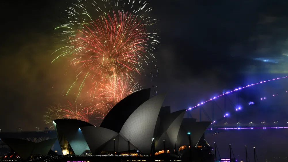 The 9pm fireworks are seen over the Sydney Opera House and Sydney Harbour Bridge during New Year's Eve celebrations in Sydney, Saturday, December 31, 2022. (AAP Image/Bianca De Marchi) NO ARCHIVING