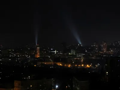 Ukrainian servicemen use searchlights as they search for drones in a sky over city during a Russian drones strike, amid Russia's attack on Ukraine, in Kyiv, Ukraine January 1, 2023. REUTERS/Gleb Garanich