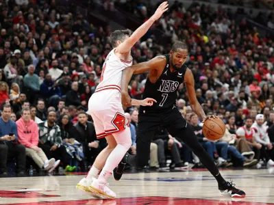 Jan 4, 2023; Chicago, Illinois, USA; Brooklyn Nets forward Kevin Durant (7) drives in the second half against Chicago Bulls guard Goran Dragic (7) at United Center. Mandatory Credit: Quinn Harris-USA TODAY Sports