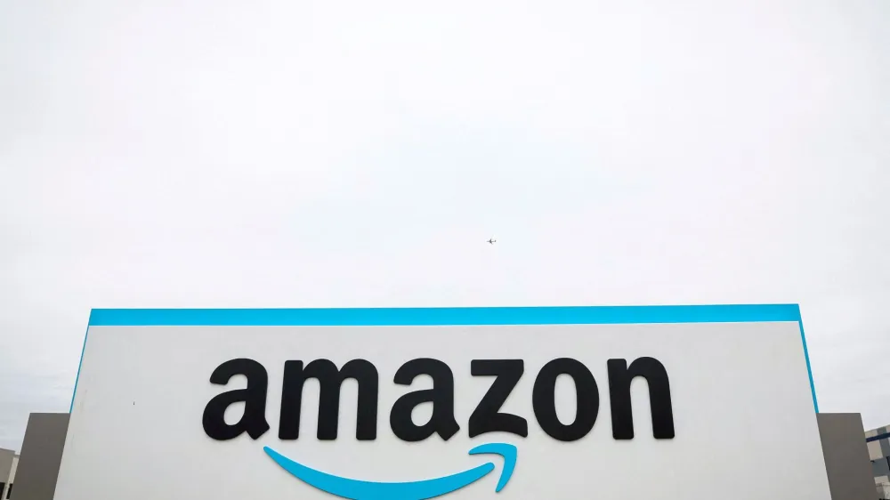 FILE PHOTO: FILE PHOTO: The Amazon logo is displayed on a sign outside the company's LDJ5 sortation center in the Staten Island borough of New York City, U.S. April 25, 2022. REUTERS/Brendan McDermid./File Photo/File Photo