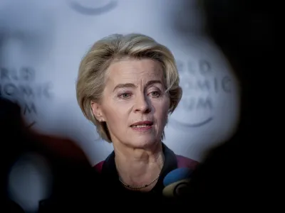 EU Commission President Ursula von der Leyen talks to media people at the World Economic Forum in Davos, Switzerland Tuesday, Jan. 17, 2023. The annual meeting of the World Economic Forum is taking place in Davos from Jan. 16 until Jan. 20, 2023. (AP Photo/Markus Schreiber)