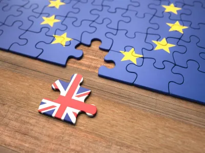 ﻿United Kingdom leaving the European Union represented in puzzle pieces.