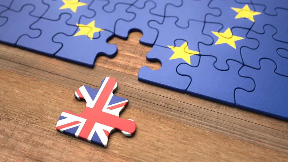 ﻿United Kingdom leaving the European Union represented in puzzle pieces.