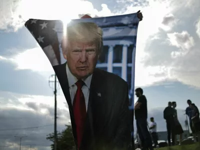 Supporters of Republican presidential candidate and former U.S. President Donald Trump wait for his arrival in Milwaukee, Wisconsin, U.S., July 14, 2024 a day after he survived an assassination attempt at a rally in Butler, Pennsylvania. REUTERS/Carlos Barria