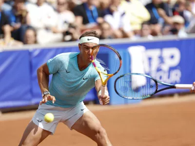 Spain's Rafael Nadal, left, and Norway's Casper Ruud's play a shot during the round of 16 double match against Mexico's Miguel Angel Reyes-Varela Martinez and Argentina's Guido Andreozzi at the Nordea Open ATP in Bastad, Sweden, Monday, July 15, 2024. (Adam Ihse/TT News Agency via AP)