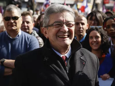 French far-left candidate for the upcoming presidential election Jean-Luc Melenchon, smiles during a march in Paris, Sunday, March 20, 2022. Jean-Luc Melenchon is rising in the polls ahead of April 10th and 24th election. (AP Photo/Thomas Padilla)