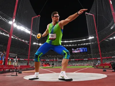 ﻿Tokyo 2020 Olympics - Athletics - Men's Discus Throw - Final - OLS - Olympic Stadium, Tokyo, Japan - July 31, 2021. Kristjan Ceh of Slovenia in action REUTERS/Dylan Martinez