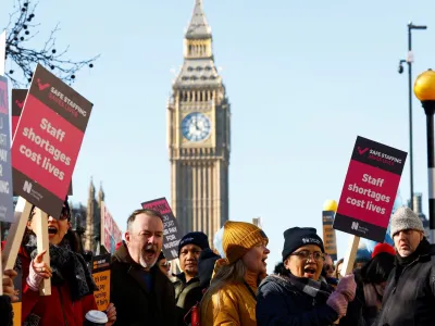 Nurses protest during a strike by NHS medical workers, amid a dispute with the government over pay, outside St Thomas' Hospital, in London, Britain, February 6, 2023. REUTERS/Peter Nicholls