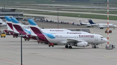 FILED - 06 October 2022, Stuttgart: Aircraft's of Eurowings airline are seen parked on the apron of the airport in Stuttgart. Photo: Bernd Weißbrod/dpa