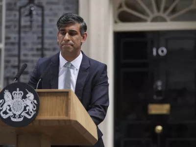 Britain's outgoing Conservative Party Prime Minister Rishi Sunak looks down as he makes a short speech outside 10 Downing Street before going to see King Charles III to tender his resignation in London, Friday, July 5, 2024. Sunak and his Conservative Party lost the general election held July 4, to the Labour Party, whose leader Keir Starmer is set become Prime Minister later Friday. (AP Photo/Kin Cheung)