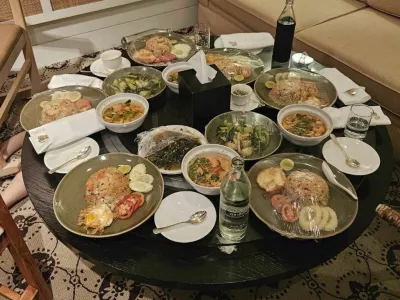 In this photo released by the Royal Thai Police, uneaten meals are left on a table in a room in the Grand Hyatt Erawan Hotel room where six people were found dead from unknown causes, Tuesday, July 16, 2024. Police said the dead in a rooms at Bangkok's Grand Hyatt Hotel were two Vietnamese Americans and four Vietnamese nationals, and speculated they might have died from some kind of poisoning. (Royal Thai Police via AP)