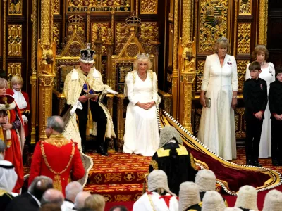 King Charles III sits alongside Britain's Queen Camilla, wearing the George IV State Diadem, during the State Opening of Parliament, in London, Wednesday, July 17, 2024.  Kirsty Wigglesworth/Pool via REUTERS