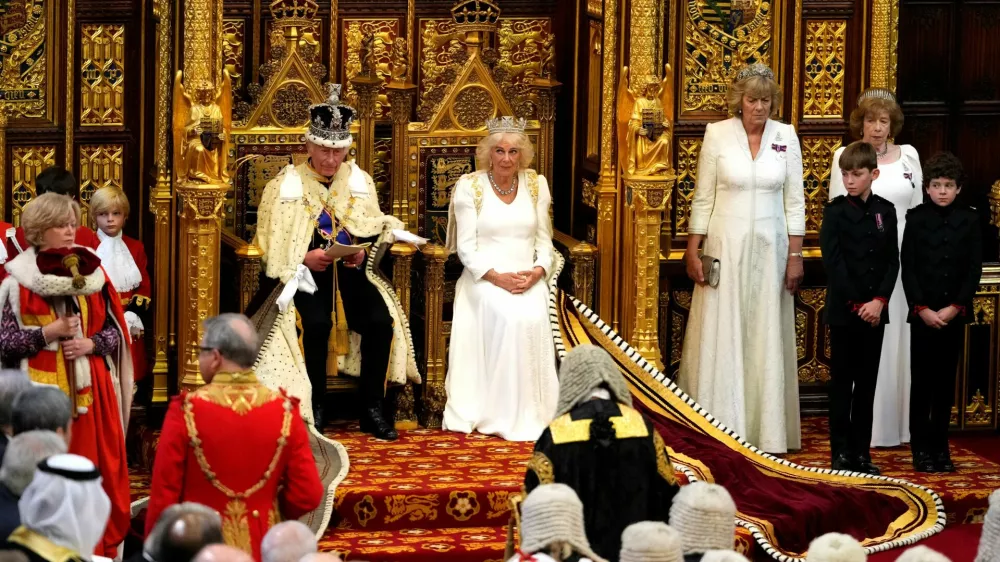 King Charles III sits alongside Britain's Queen Camilla, wearing the George IV State Diadem, during the State Opening of Parliament, in London, Wednesday, July 17, 2024.  Kirsty Wigglesworth/Pool via REUTERS