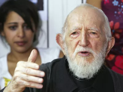 FILE - Abbe Pierre addresses journalists in his home of Alfortville, east of Paris, on Aug. 5, 2005. Several women have accused late French priest Abbe Pierre of sexual assault or harassment, his foundation said Wednesday July 17, 2024. Abbe Pierre was one of France's most beloved public figures and a lifelong advocate for the homeless. (AP Photo/Remy de la Mauviniere)