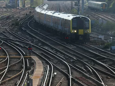 Trains travel towards Clapham Junction railway station, on the day of the State Opening of Parliament in London, Britain, July 17, 2024. REUTERS/Toby Melville