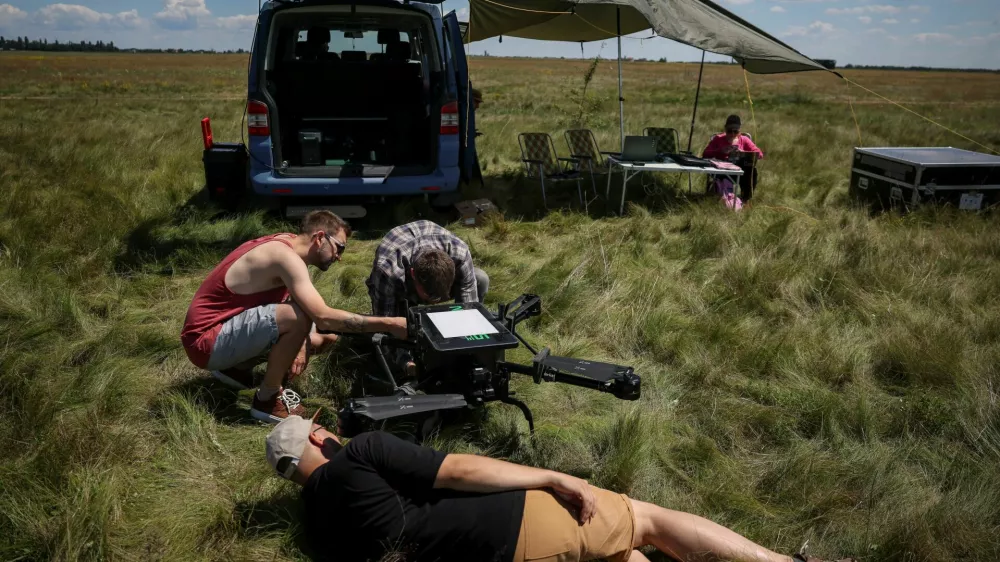 Employees of Swarmer company prepare the AI-enabled drone for flight, amid Russia's attack on Ukraine, in Kyiv region, Ukraine June 27, 2024. REUTERS/Gleb Garanich