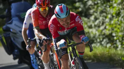 Stage winner Belgium's Victor Campenaerts sets the pace for the breakaway with Poland's Michal Kwiatkowski, in second position and France's Matteo Vercher, rear, during the eighteenth stage of the Tour de France cycling race over 179.5 kilometers (111.5 miles) with start in Gap and finish in Barcelonette, France, Thursday, July 18, 2024. (AP Photo/Daniel Cole)