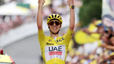 Cycling - Tour de France - Stage 19 - Embrun to Isola 2000 - Embrun, France - July 19, 2024 UAE Team Emirates' Tadej Pogacar celebrates winning stage 19 REUTERS/Manon Cruz