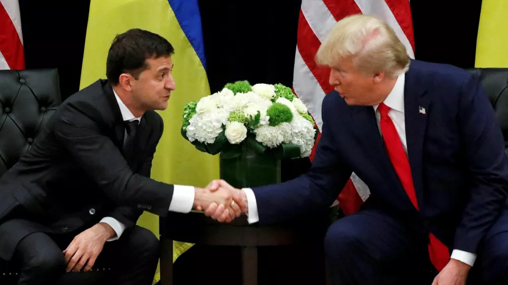 FILE PHOTO: Ukraine's President Volodymyr Zelenskiy greets U.S. President Donald Trump during a bilateral meeting on the sidelines of the 74th session of the United Nations General Assembly (UNGA) in New York City, New York, U.S., September 25, 2019. REUTERS/Jonathan Ernst/File Photo